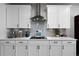 The kitchen has white countertops and a modern range hood at 29 Laurelwood Nw Ln, Cartersville, GA 30121