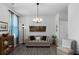 Cozy living room with hardwood floors, stylish furniture, and a decorative tapestry at 29 Laurelwood Nw Ln, Cartersville, GA 30121