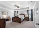 Main bedroom featuring neutral tones, carpeted floors, and good natural light at 29 Laurelwood Nw Ln, Cartersville, GA 30121
