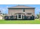 Spacious backyard features a large deck with outdoor seating, perfect for entertaining at 346 M J Mccarthy Way, Hampton, GA 30228