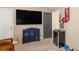 Cozy bonus room featuring a large TV, a beverage cooler, and unique decor at 346 M J Mccarthy Way, Hampton, GA 30228