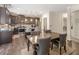 An open concept eat-in kitchen with an island, stainless appliances, and adjacent dining area at 346 M J Mccarthy Way, Hampton, GA 30228