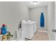 Laundry room with modern washer and dryer at 6350 Lantana Village Way, Cumming, GA 30028