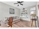 Cozy living room with neutral walls, built-in shelves, and a comfortable sofa at 6350 Lantana Village Way, Cumming, GA 30028