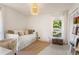 Bright bedroom featuring a daybed with storage, lots of natural light, and modern design at 1025 Martins Lake Close, Roswell, GA 30076