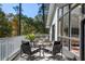 Cozy outdoor seating area on the deck, perfect for relaxing and enjoying the view at 1025 Martins Lake Close, Roswell, GA 30076