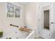 Relaxing bath featuring a soaking tub and a window with natural light at 1303 Bass Dr, Woodstock, GA 30189