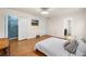 Bright bedroom features hardwood floors, closet, and ensuite bathroom at 1303 Bass Dr, Woodstock, GA 30189