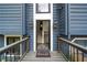 Close-up of front door, showcasing a welcoming entrance with decorative accents and an inviting ambiance at 1303 Bass Dr, Woodstock, GA 30189