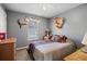 Neutral-toned bedroom with carpet, one window, and gray walls at 170 Cobblestone Ct, Douglasville, GA 30134
