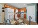 Eat-in kitchen featuring wood cabinets, and a full appliance package at 170 Cobblestone Ct, Douglasville, GA 30134
