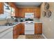 Kitchen featuring modern appliances, granite counters, and ample counter space at 170 Cobblestone Ct, Douglasville, GA 30134