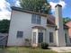 The house features a bay window, side chimney and vinyl siding at 3259 S Pointe Ct, Atlanta, GA 30340