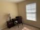 Cozy bedroom area with desk and natural light at 3259 S Pointe Ct, Atlanta, GA 30340