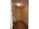 Carpeted walk-in closet with metal shelving and a light at 3259 S Pointe Ct, Atlanta, GA 30340