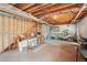 Spacious unfinished basement area with exposed ceiling, concrete walls and lots of storage area at 2138 Bramlett Nw Pl, Marietta, GA 30064