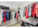 Walk-in closet with plentiful hanging space and shelving for organized storage at 2138 Bramlett Nw Pl, Marietta, GA 30064