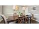 Traditional dining room with hardwood floors, classic chairs, and stylish pendant lighting at 2138 Bramlett Nw Pl, Marietta, GA 30064