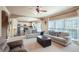 Bright and spacious living room with multiple windows and views to kitchen at 2138 Bramlett Nw Pl, Marietta, GA 30064