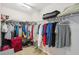 Spacious walk-in closet with built-in shelving and plenty of hanging storage space at 2138 Bramlett Nw Pl, Marietta, GA 30064