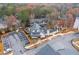 Top down aerial view of the parking lot of the clubhouse of the community highlighting the trees at 3933 Danube Ln # 224, Atlanta, GA 30339