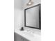 Modern bathroom featuring a large mirror, white countertops, and stylish fixtures at 3933 Danube Ln # 224, Atlanta, GA 30339
