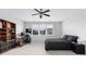 Bright bedroom with a ceiling fan, large window, and light carpet at 3933 Danube Ln # 224, Atlanta, GA 30339