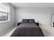 Bedroom featuring a neutral color scheme and a large window at 3933 Danube Ln # 224, Atlanta, GA 30339
