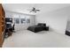 Spacious bedroom with a large window, neutral carpet, and ample natural light at 3933 Danube Ln # 224, Atlanta, GA 30339