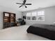 Bright bedroom with a ceiling fan, large window, and light carpet at 3933 Danube Ln # 224, Atlanta, GA 30339