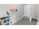 The garage shows an interior entrance, garage door, cleaning supplies, and a concrete floor at 3933 Danube Ln # 224, Atlanta, GA 30339