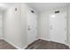 Hallway featuring unit 224 and unit 226 with clean modern floors at 3933 Danube Ln # 224, Atlanta, GA 30339