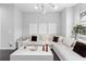 Cozy living room with modern furniture, neutral tones, and ample natural light at 3933 Danube Ln # 224, Atlanta, GA 30339