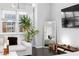 Bright living room with a large window, modern decor, and hardwood floors at 3933 Danube Ln # 224, Atlanta, GA 30339