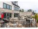 Outdoor patio with stone floors, a staircase, a grill, and comfortable seating for enjoying the outdoors at 3933 Danube Ln # 224, Atlanta, GA 30339