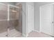 Bathroom features tiled shower with a glass door at 3933 Danube Ln # 224, Atlanta, GA 30339