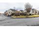 Charming street view showcasing the community's lush greenery and well-designed townhome exteriors at 3933 Danube Ln # 224, Atlanta, GA 30339
