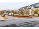 Street view of stylish townhomes with well-maintained landscaping and a clear street sign at 3933 Danube Ln # 224, Atlanta, GA 30339