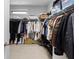 Spacious walk-in closet providing ample storage and organization with clothing racks and shelves at 3933 Danube Ln # 224, Atlanta, GA 30339