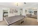 Spacious basement rec room with a ping pong table and open access to other rooms at 4215 Homestead Ridge Dr, Cumming, GA 30041