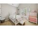 Cozy bedroom featuring sloped ceilings, neutral decor, and decorative dressers at 4215 Homestead Ridge Dr, Cumming, GA 30041