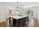 Open kitchen boasts a large island, stainless appliances, and a breakfast area with views to the backyard at 4215 Homestead Ridge Dr, Cumming, GA 30041