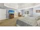 Large main bedroom with neutral walls, carpet, and windows overlooking the backyard at 4215 Homestead Ridge Dr, Cumming, GA 30041