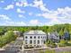 Exterior shot of a charming two-story building with a sign that reads PARK 108 at 108 Park Place Unit 104, Decatur, GA 30030