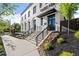 Exterior view of a building with stairs and landscaping at 108 Park Place Unit 104, Decatur, GA 30030