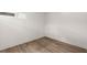 Empty room with hardwood floors and white walls shows neutral space at 108 Park Place Unit 104, Decatur, GA 30030