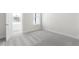Cozy bedroom featuring a door, window for natural light and soft carpet floors at 2572 Silver Star Ne Dr, Marietta, GA 30066