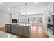 Contemporary kitchen with a large island, modern appliances, and open to the living room at 2572 Silver Star Ne Dr, Marietta, GA 30066