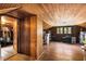 Large attic with wood paneled walls, wood floors, and room for storage at 637 Linwood Ne Ave, Atlanta, GA 30306