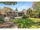 Charming backyard featuring a patio area perfect for outdoor entertaining and a lush green lawn at 637 Linwood Ne Ave, Atlanta, GA 30306